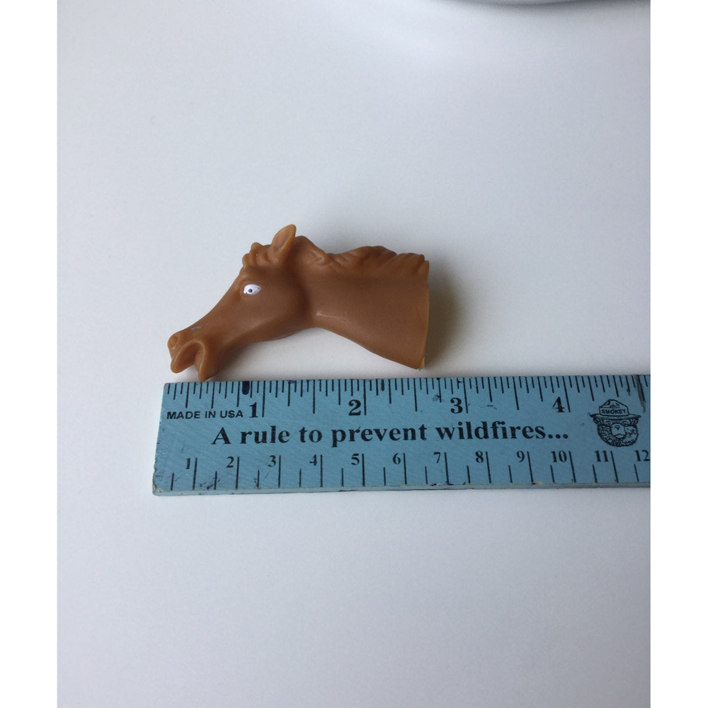 Plastic horse finger puppet